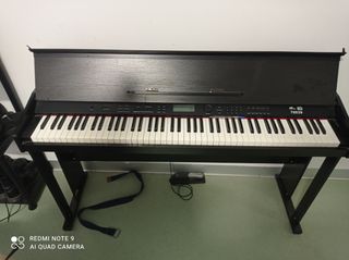Piano eléctrico con pedal