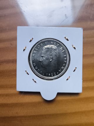 2 monedas de 50 y 100 pesetas