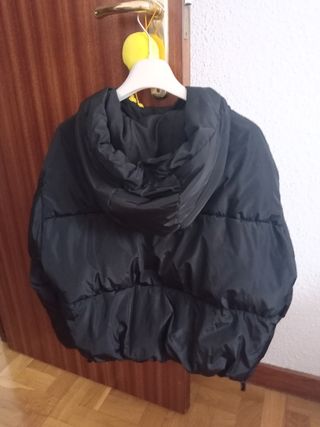 Plumifero corto negro