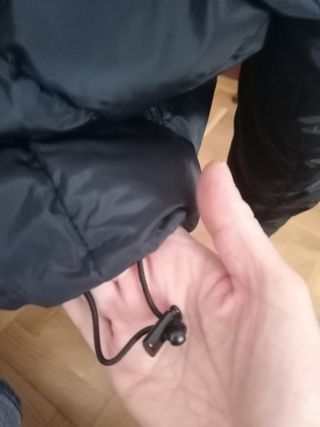 Plumifero corto negro