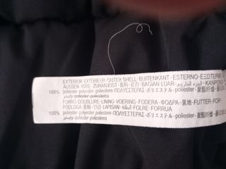 Plumifero corto negro