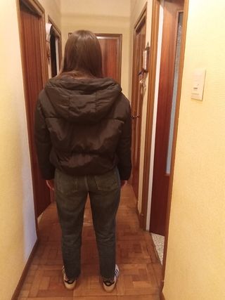 Plumifero corto negro