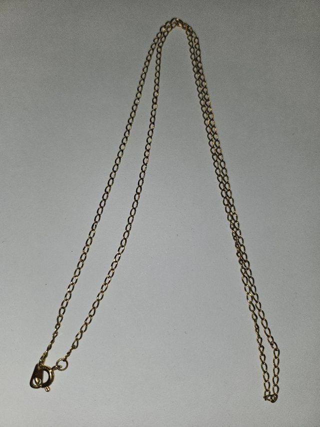 Crucifijo con cadena