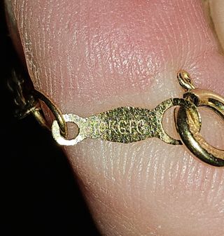 Crucifijo con cadena