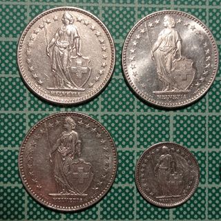 7 monedas suizas 