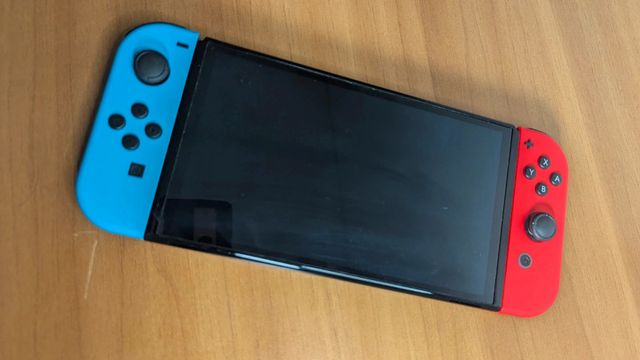 Nintendo switch OLED completo di accessori (a183)