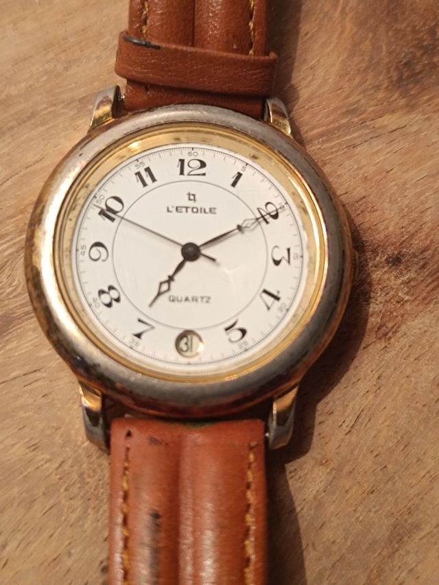 Reloj L' ETOILE Antiguo
