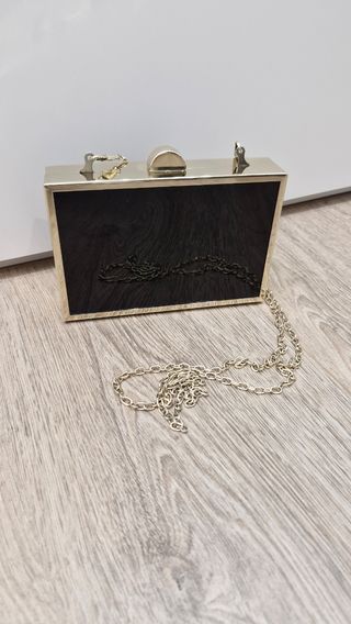 Clutch de fiesta negro y dorado