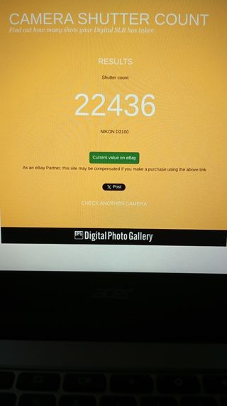 Cámara Nikon D3100 y objetivo