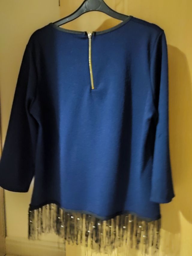 Camisa para mujer con flecos