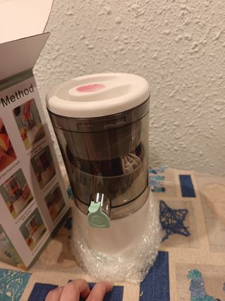 Exprimidor electrico