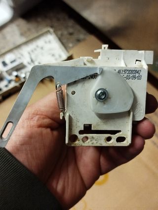 Activador compartimiento detergente