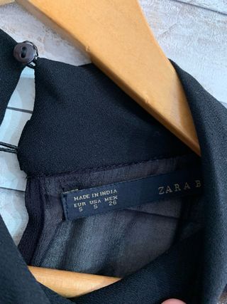 Mono de short negro con lentejuelas