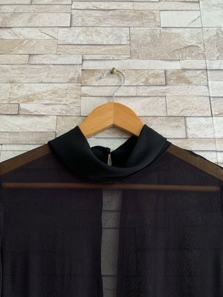 Mono de short negro con lentejuelas