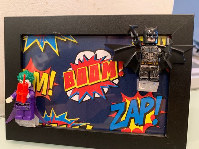 Pittura retrò di Batman e Joker in stile Lego