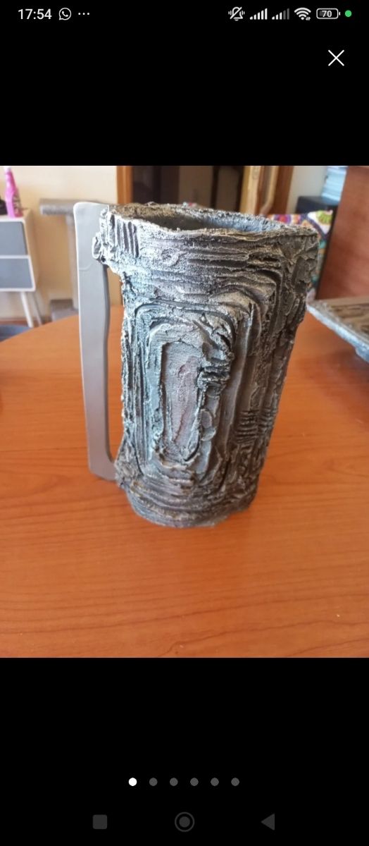 Pack jarrón y reloj.