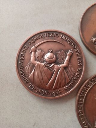9 medallas conmemorativas