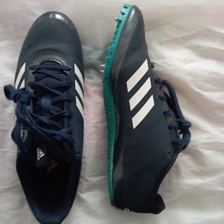 Zapatillas de clavos para carreras de velocidad.