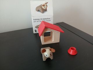Caseta perro juguete