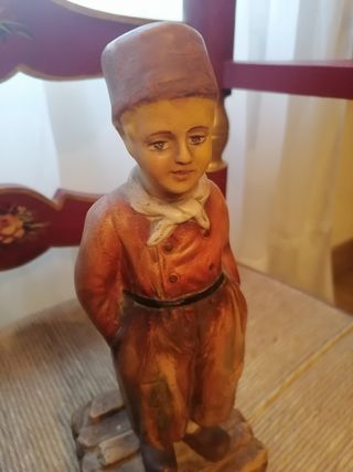 Pareja ceramica niño fumador