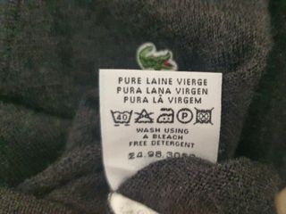 Lacoste. Jersey pico lana negro.