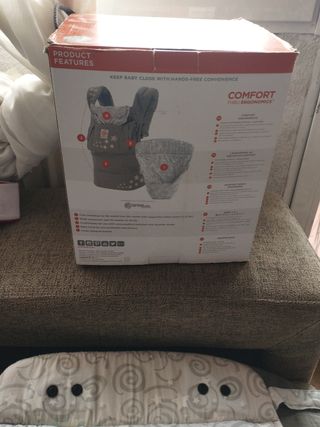 Canguro porta-bebes con su caja
