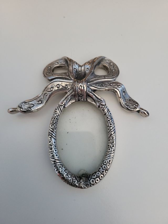 Cornice antica in argento