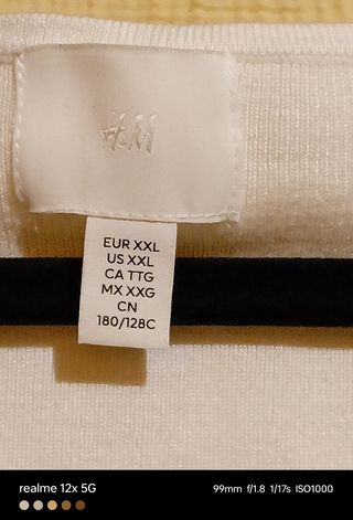 Jersey crema con abalorio perla HyM