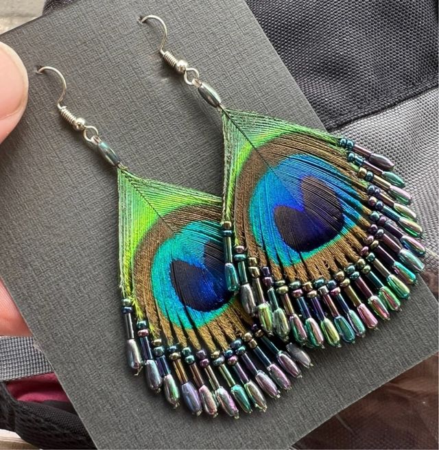 Pendientes plata Krishna pluma pavo real