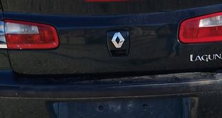 Pulsador portón maletero laguna