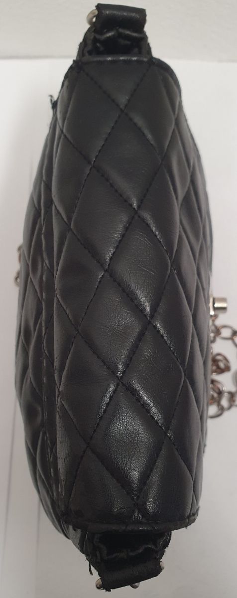 Poscett nera trapuntata