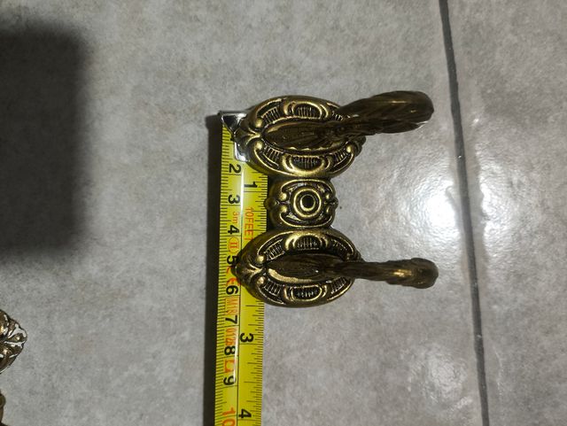 Recoge cortinas alzapaños de bronce