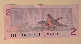 Due banconote Canada da 1 e 2 dollari