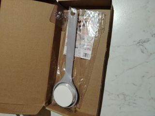 Applicatore crema dietro la schiena