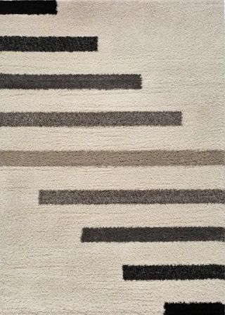 Alfombra blanca con diseño geométrico