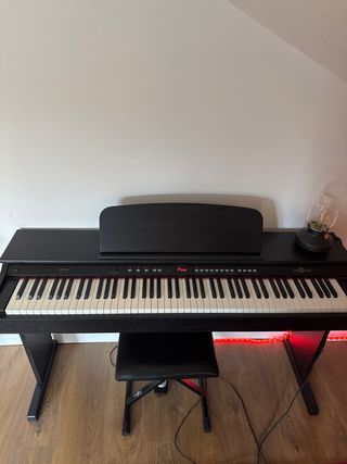Piano teclas contrapesadas