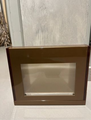 Expositor Gucci marrón  dorado