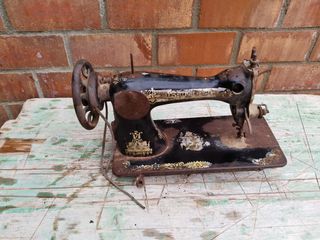 Maquina de coser antigua Singer