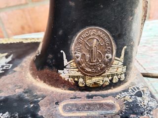 Maquina de coser antigua Singer