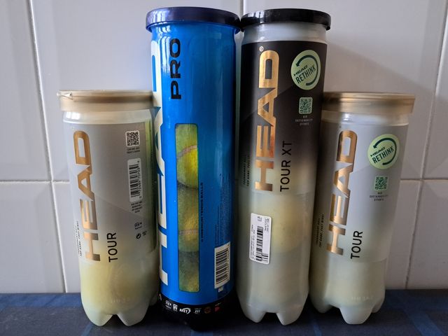 4 latas de bolas de tênis