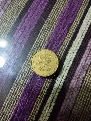 Moneda 10 cent dragón 1999