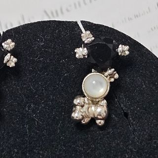 Pendientes Tous. No negociable