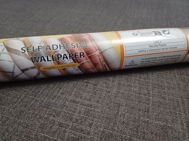 Rollo Vinilo y lámina mariposa.