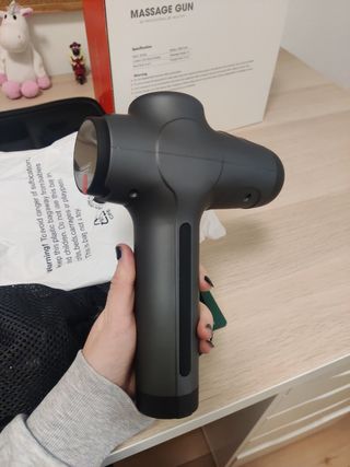 Pistola de masajes nueva