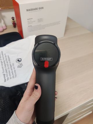 Pistola de masajes nueva