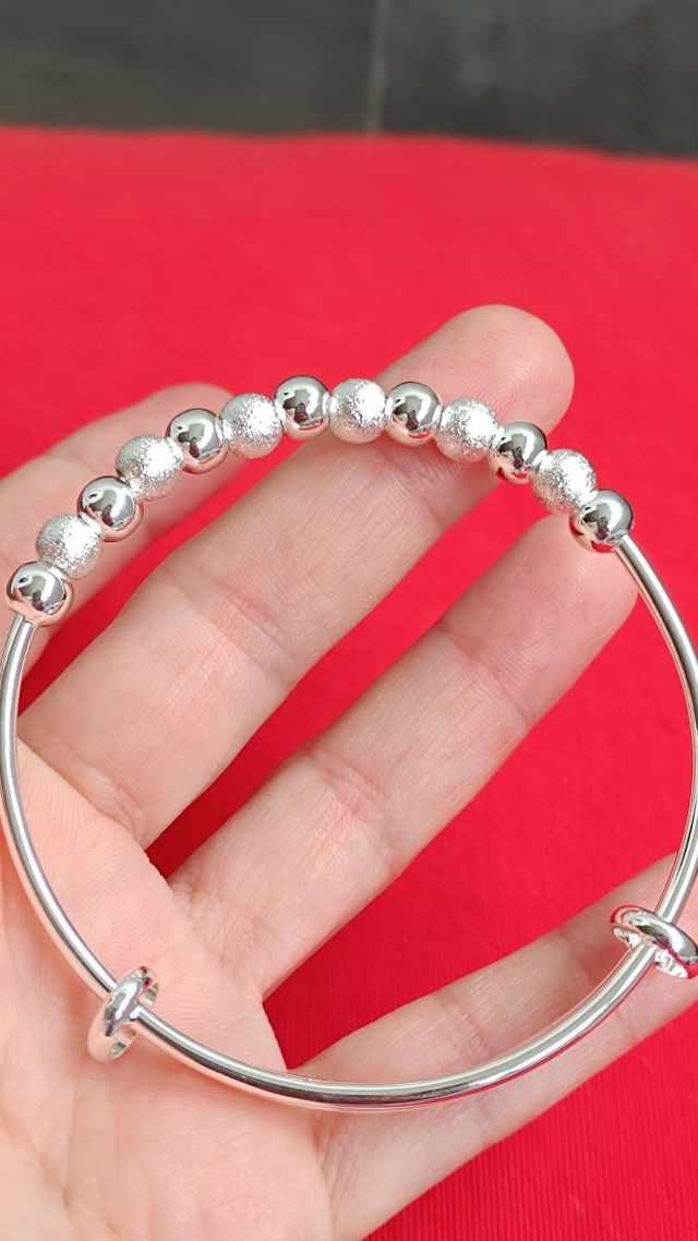 Pulsera plata bolitas