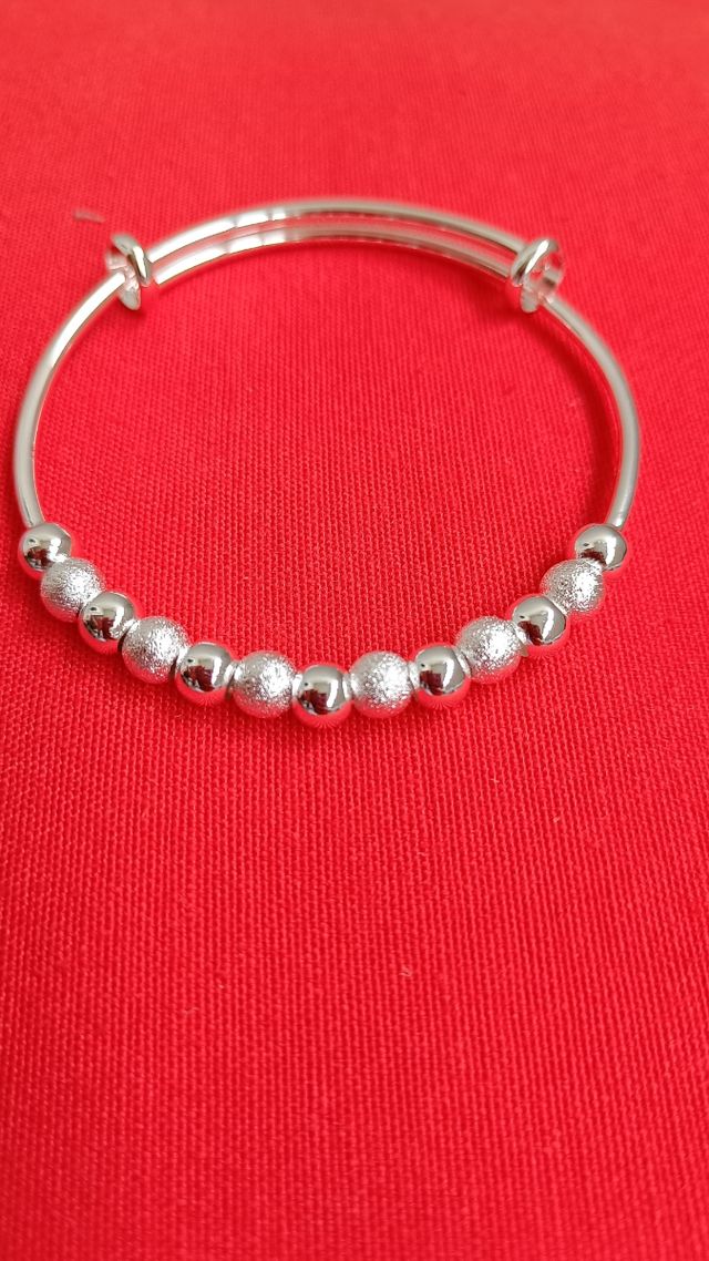 Pulsera plata bolitas
