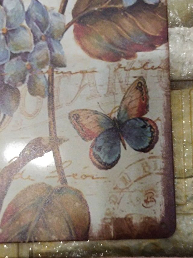 Dos carteles de metal vintage