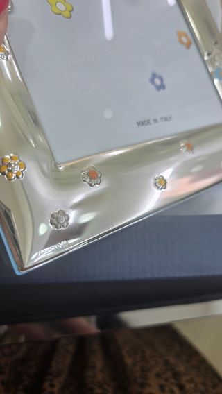 Cornice argento bimbo