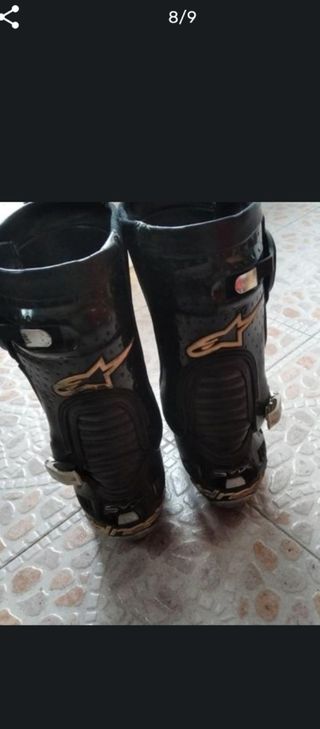 Traje cuero y botas